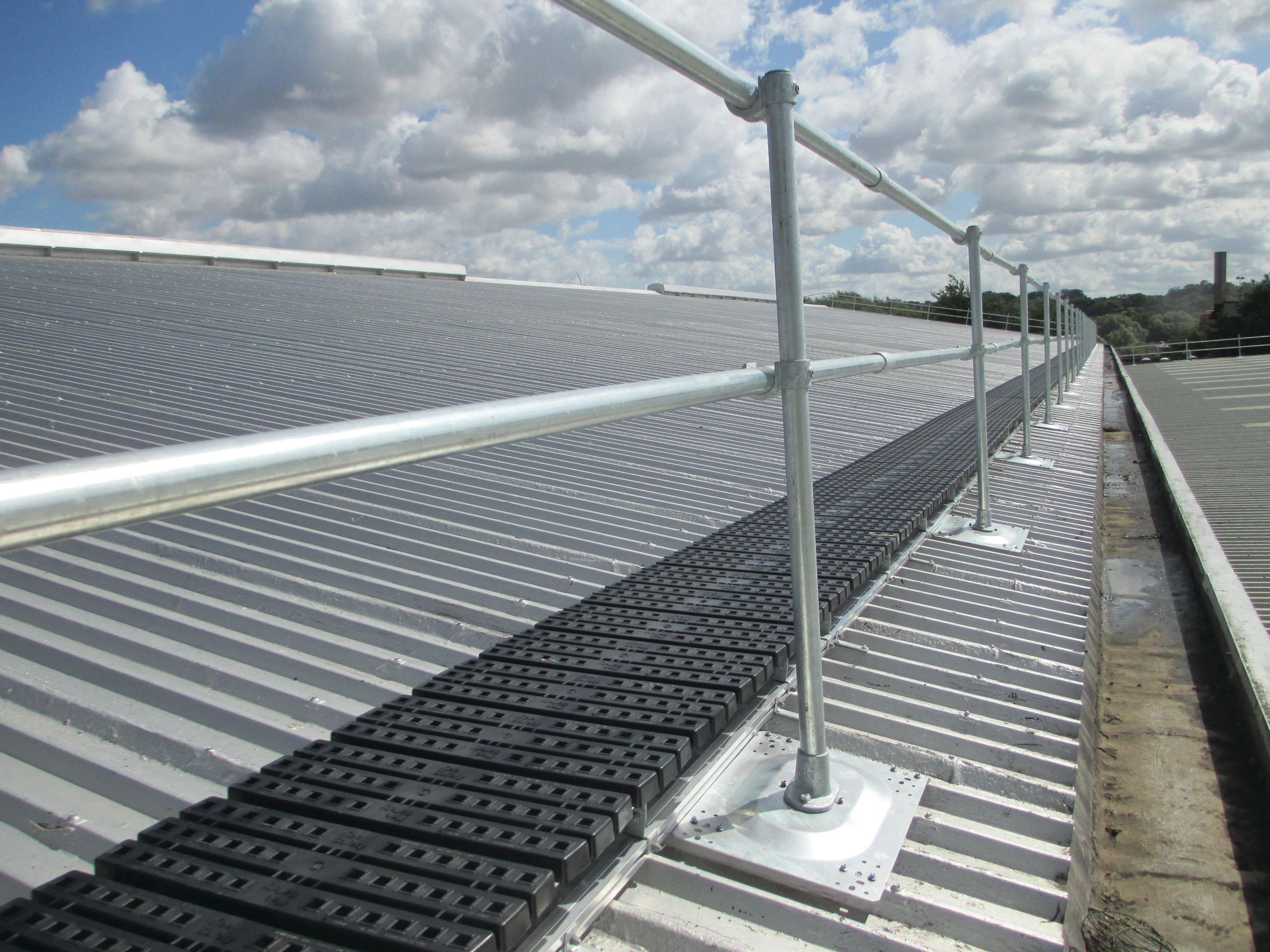 Guardrail on Metal roof in a Warehouse Facility